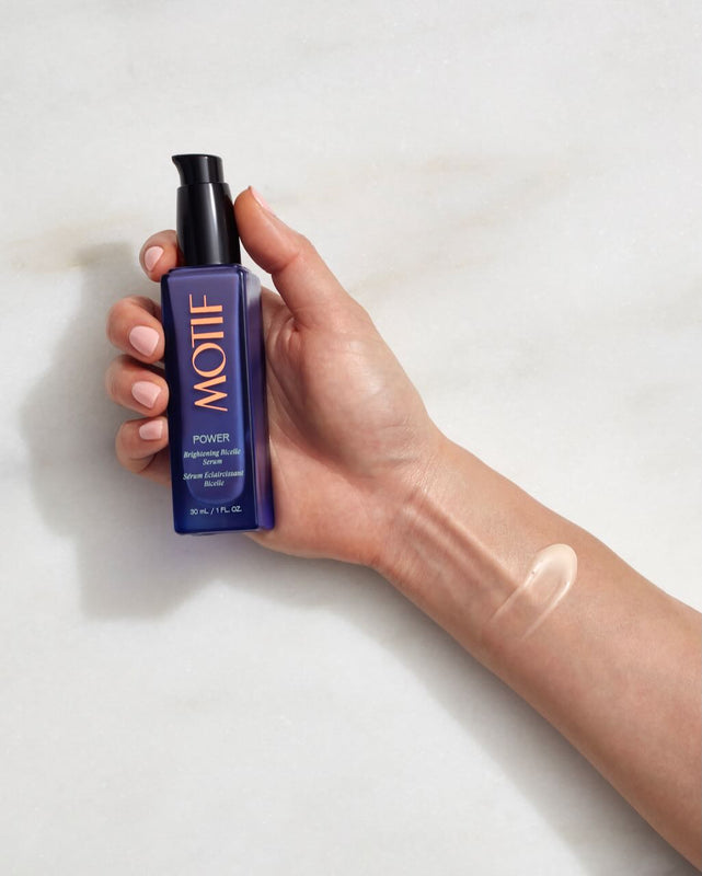 Lightweight texture of Motif Power antioxidant glow serum for healthy skin on arm
