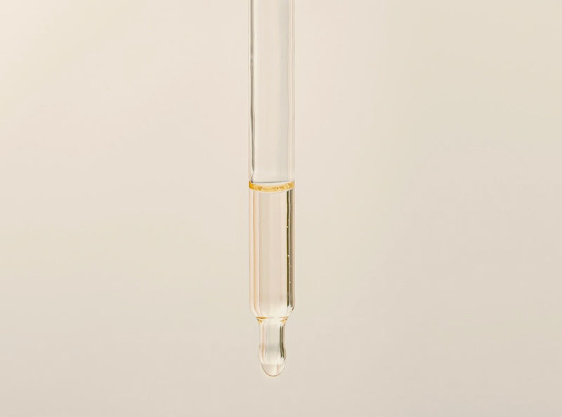 Scientific and clean skincare product shown in a dropper
